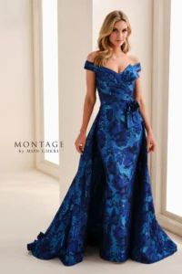Style M4201 By Montage Mother of the Bride or Groom Brocade Off-Shoulder Sheath Gown w/ 3D Flower At Precious Memories, Malden shown in Lapis