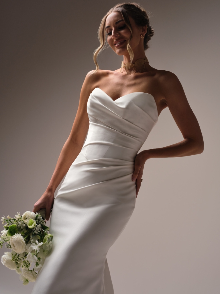 Giselle Lane by Sottero and Midgley, a division of Maggie Sottero, satin draped wedding dress close up view